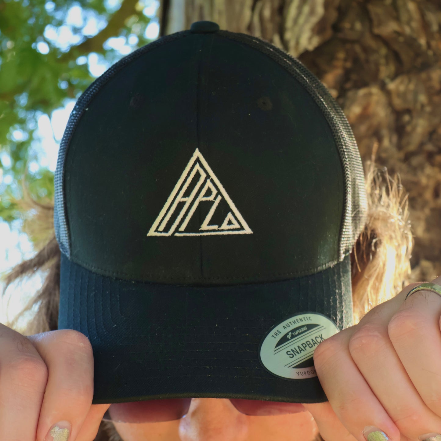 A.P.L.O. Signature Trucker
