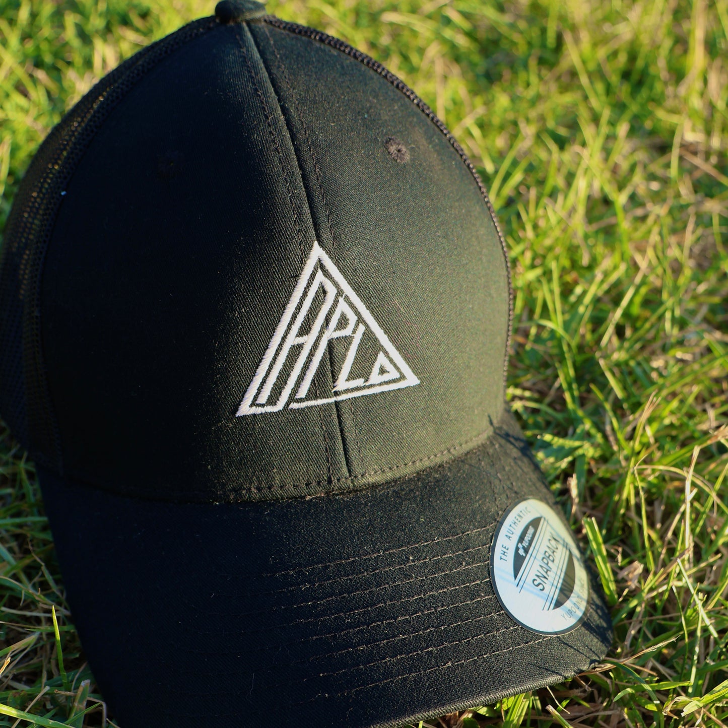 A.P.L.O. Signature Trucker